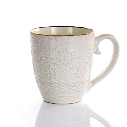 Elama Contessa 12 oz ivory stoneware mug, side view of the embossed floral lace pattern and handle