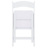 Elama 4 Piece White Folding Resin Dining Chairs with Removable Seat Pads (600 lb Capacity)
