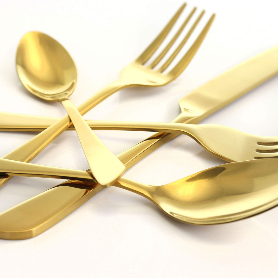 Close-up of the MegaChef Gibbous gold flatware finish on the spoon bowls, fork tines and knife blade