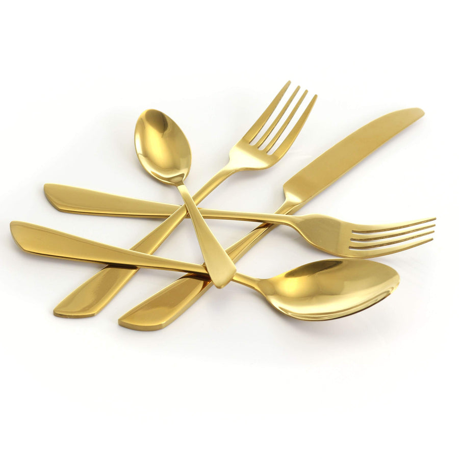 MegaChef Gibbous gold stainless steel forks, knife and spoons crossed on a white surface, showing the tapered handles
