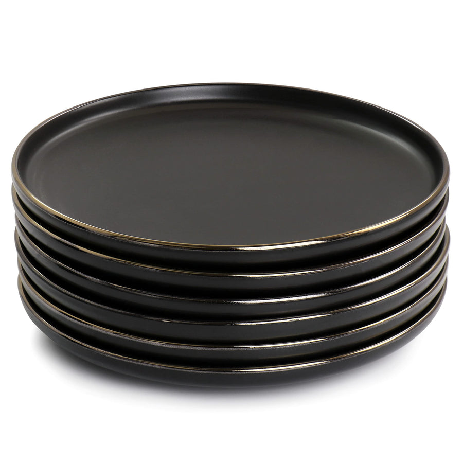 Stack of six matte black salad plates with gold rim