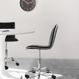 Elama black striped armless rolling chairs at a round white table, lifestyle in a bright dining or meeting space
