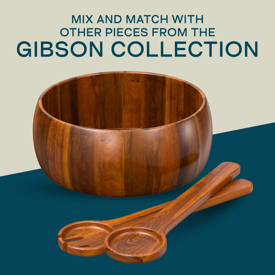Empty Laroda staved acacia wood salad bowl with the serving fork and spoon crossed in front, Gibson collection graphic