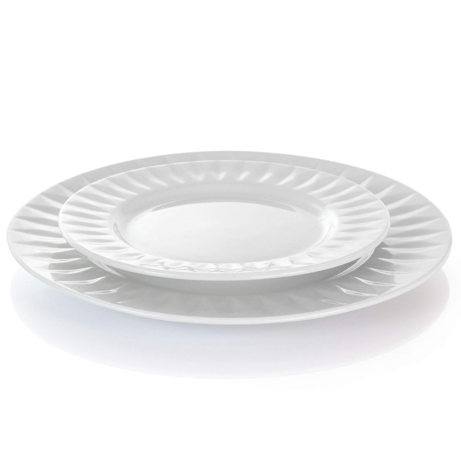 Elama Sienna white porcelain dessert plate stacked on the dinner plate, side view of the embossed rims