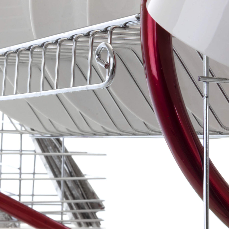 Close-up under the upper plate tier of the MegaChef red 2-tier dish rack, curved red frame and utensil holder below