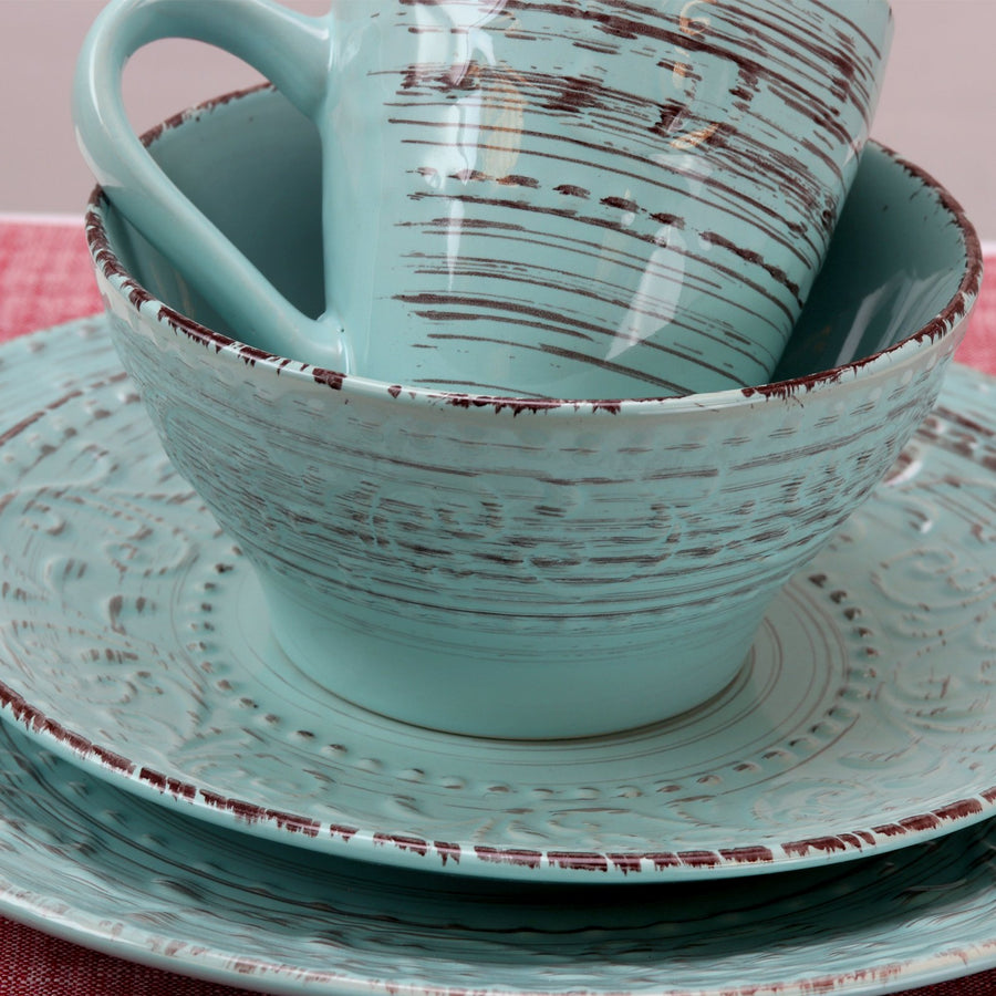 Hand-painted turquoise stoneware mug, bowl and plates with brown brushed rim, coastal dinnerware