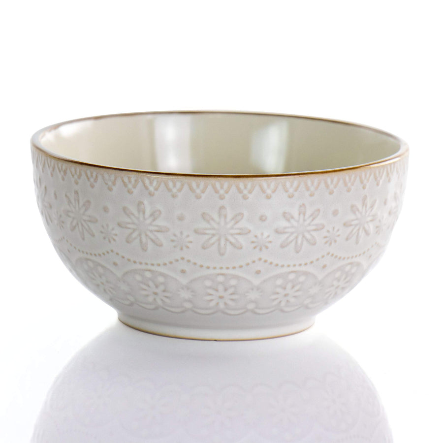 Elama Contessa 6 inch ivory stoneware bowl, side view of the embossed flower and lace band with brown rim