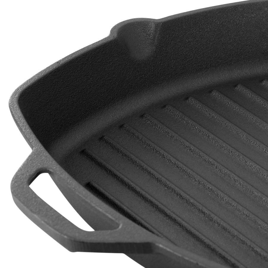 Close up of grill pan ridges and helper handle on pre-seasoned cast iron