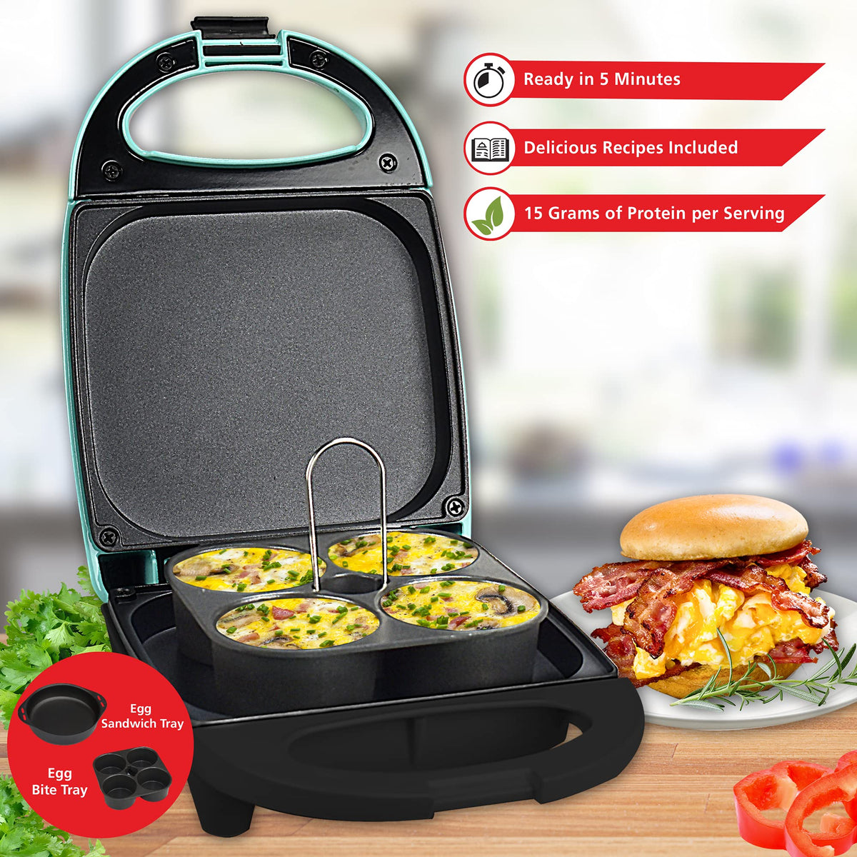 Open Brentwood egg bite maker with nonstick plates holding four egg bites next to a breakfast sandwich