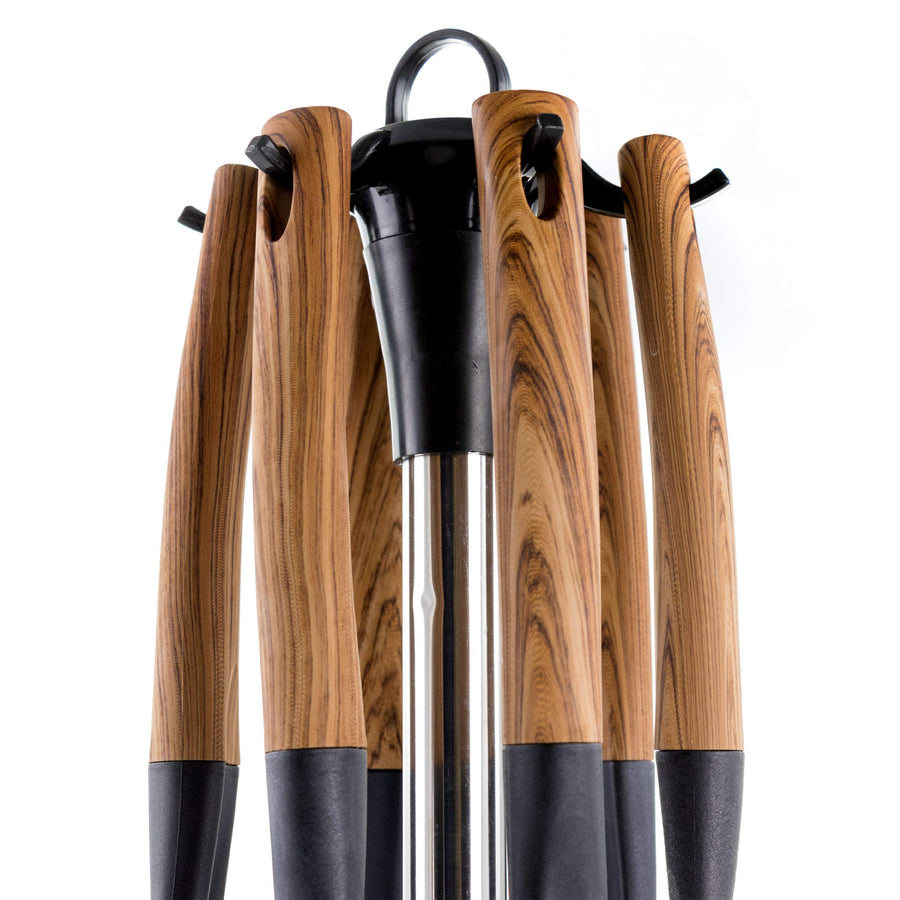 Close up of wood-look utensil handles on the rotating stand