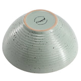 Underside of a green Elama Emilia speckled stoneware bowl with dishwasher and microwave safe backstamp