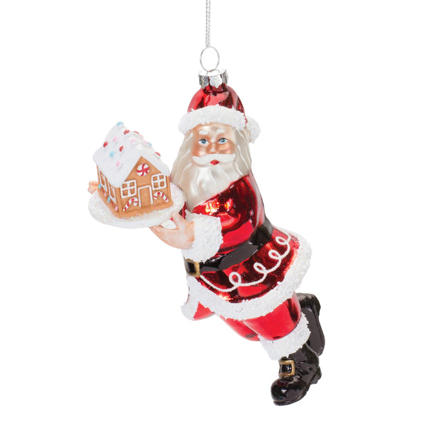 Six red and white glass Santa Christmas ornaments with glittered gingerbread houses and silver string hangers