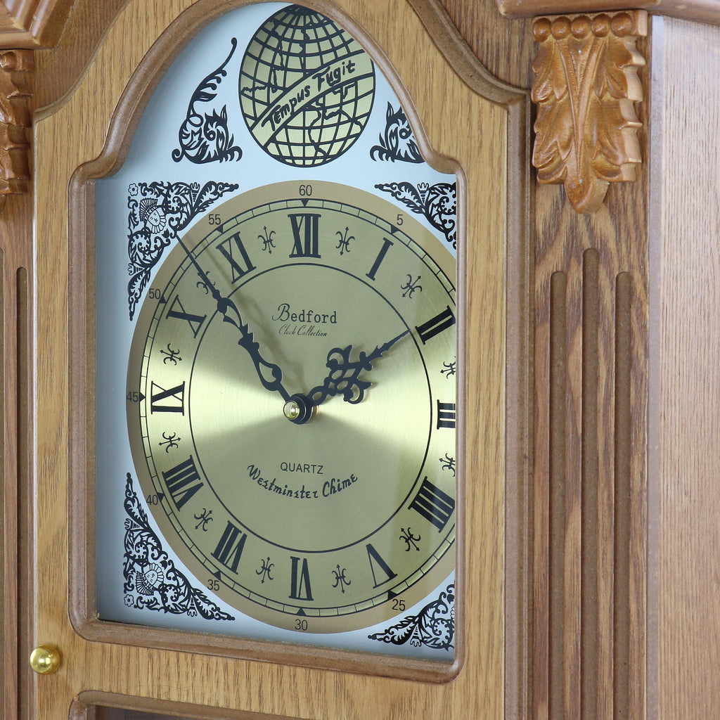 Bedford Clock Collection Honey Oak 29" Chiming Pendulum Wall Clock – Quartz Westminster Chimes, Golden Oak Finish with Roman Numeral Metal Dial