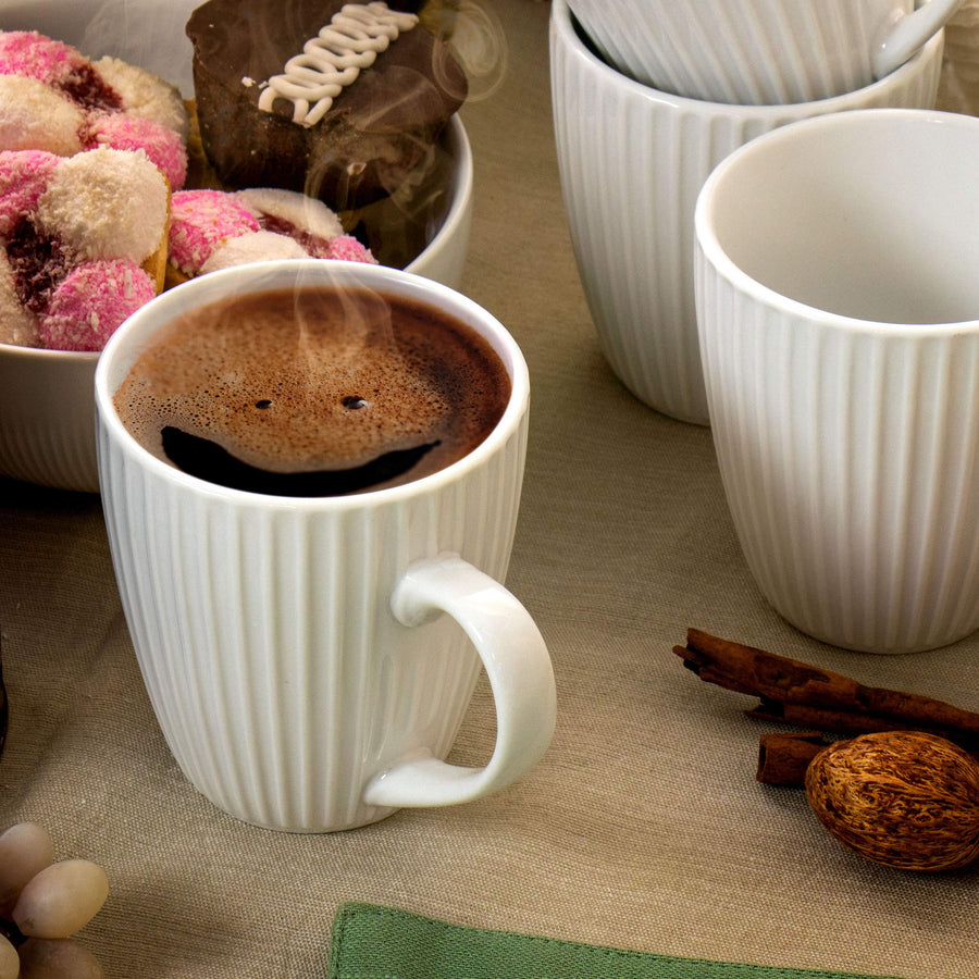 Elama Elle 12 Piece Round Porcelain Mug Set in White, 8 oz