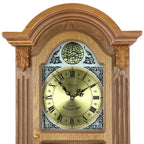 Bedford Clock Collection Honey Oak 29" Chiming Pendulum Wall Clock – Quartz Westminster Chimes, Golden Oak Finish with Roman Numeral Metal Dial