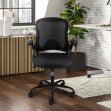 Elama black compact mesh office chair, lifestyle in a home office with wood floors, a rug and a plant