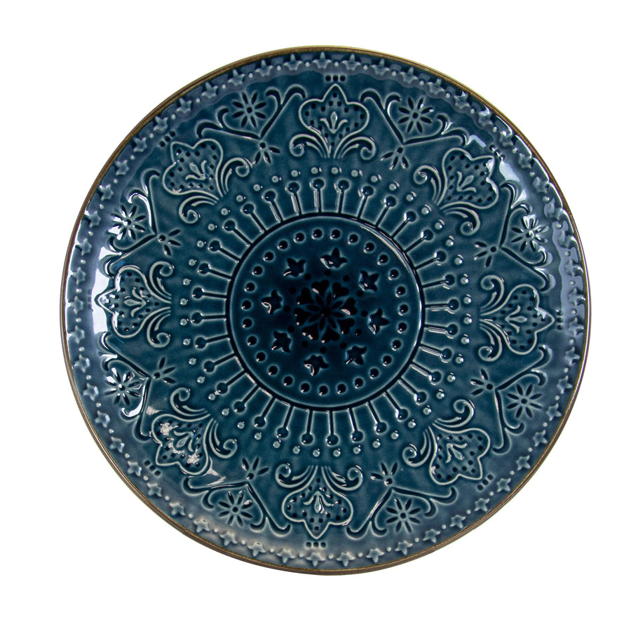 Top view of an Elama Deep Sea Mozaic plate with raised mandala texture, reactive sea blue glaze and brown rim