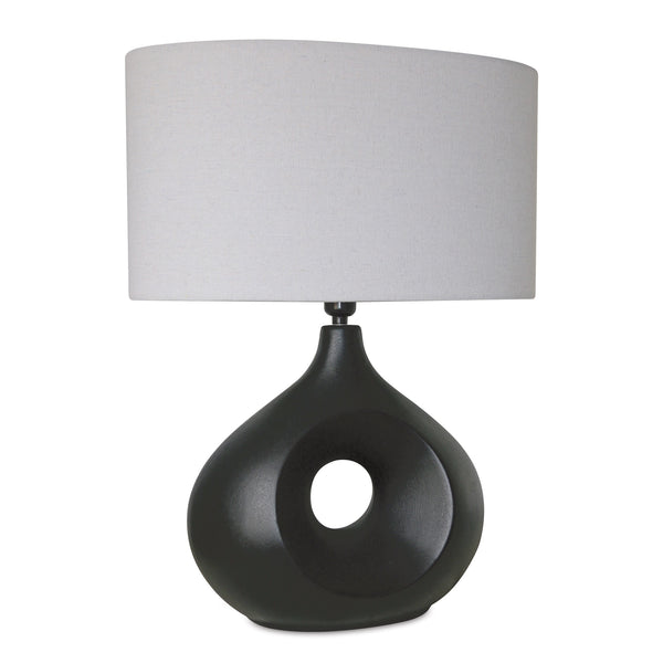 Modern table lamp with a black and grey ceramic base in a circle design and a linen shade