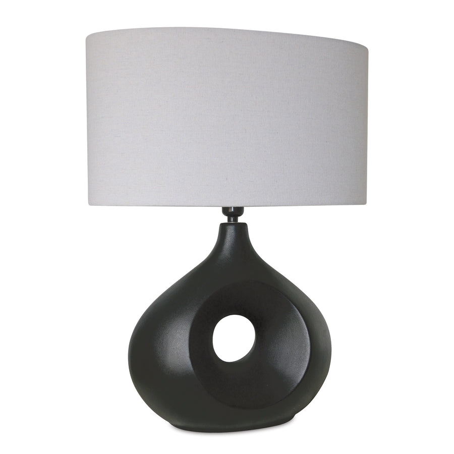 Modern table lamp with a black and grey ceramic base in a circle design and a linen shade