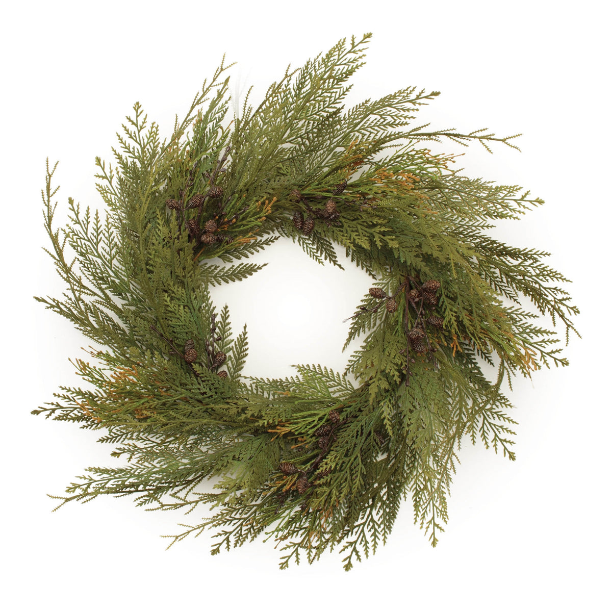 Round cedar Christmas wreath with small natural pinecones on a grapevine twig base