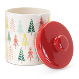 White ceramic Christmas cookie jar with a red and green pine tree print and a red lid