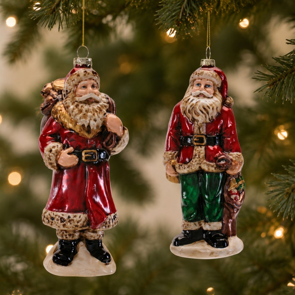 Glass Santa Christmas Ornaments hanging on a Christmas tree, holiday decor styling idea