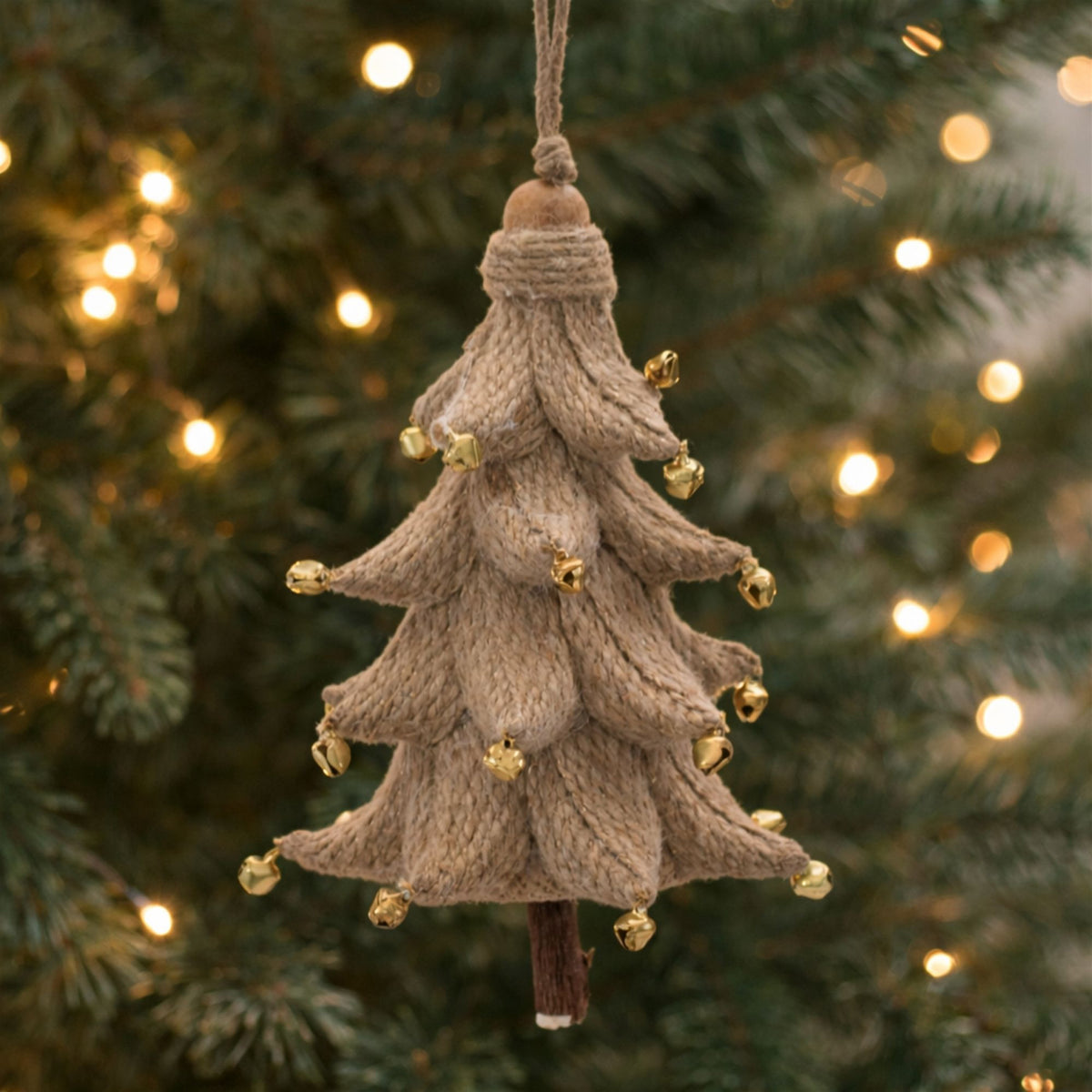 Jute Wrapped Cone Tree Christmas Ornaments hanging on a Christmas tree, holiday decor styling idea