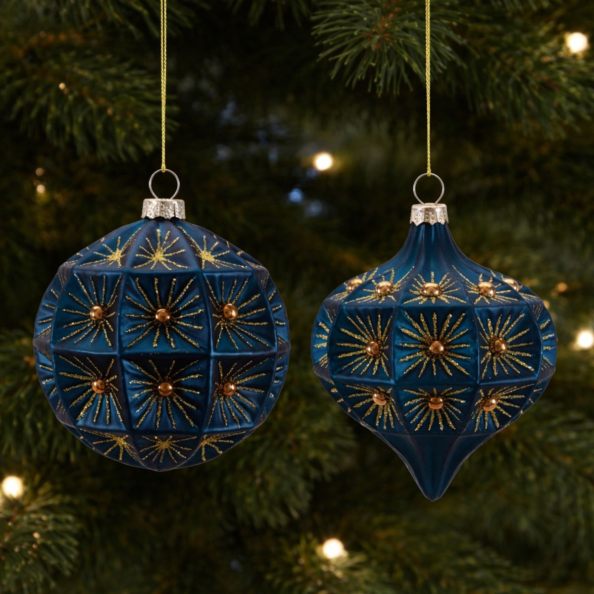 Navy Blue Glass Ball and Onion Christmas Ornaments hanging on a Christmas tree, holiday decor styling idea