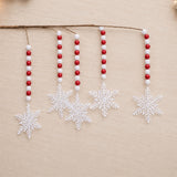 Red and White Snowflake Bead Drop Spray styled in holiday decor, faux Christmas spray arrangement idea