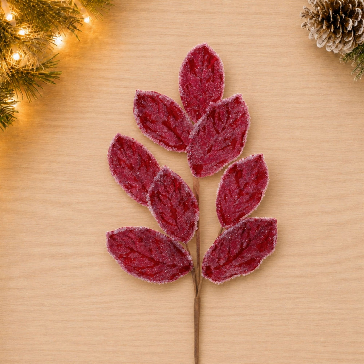 Red Beaded Magnolia Leaf Sprays styled in holiday decor, faux Christmas spray arrangement idea