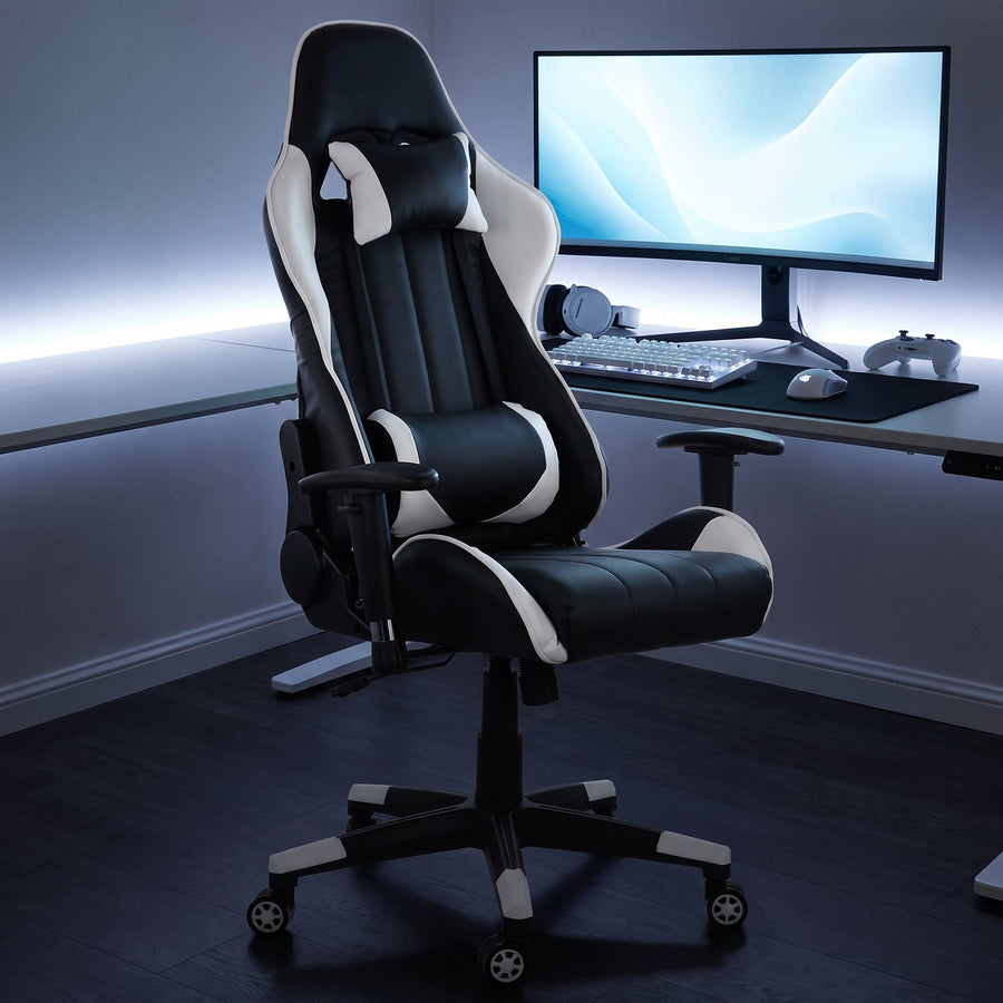 GameFitz GF-2101 black and white gaming chair at a battle station desk with a curved monitor and white keyboard