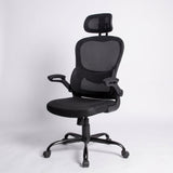 Ergonomic high back mesh office chair with adjustable headrest and flip-up arms, black frame, Elama desk chair on a studio floor