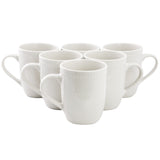 Elama Olevia set of six white stoneware 12 oz coffee mugs with two rows of embossed dots, arranged in a pyramid