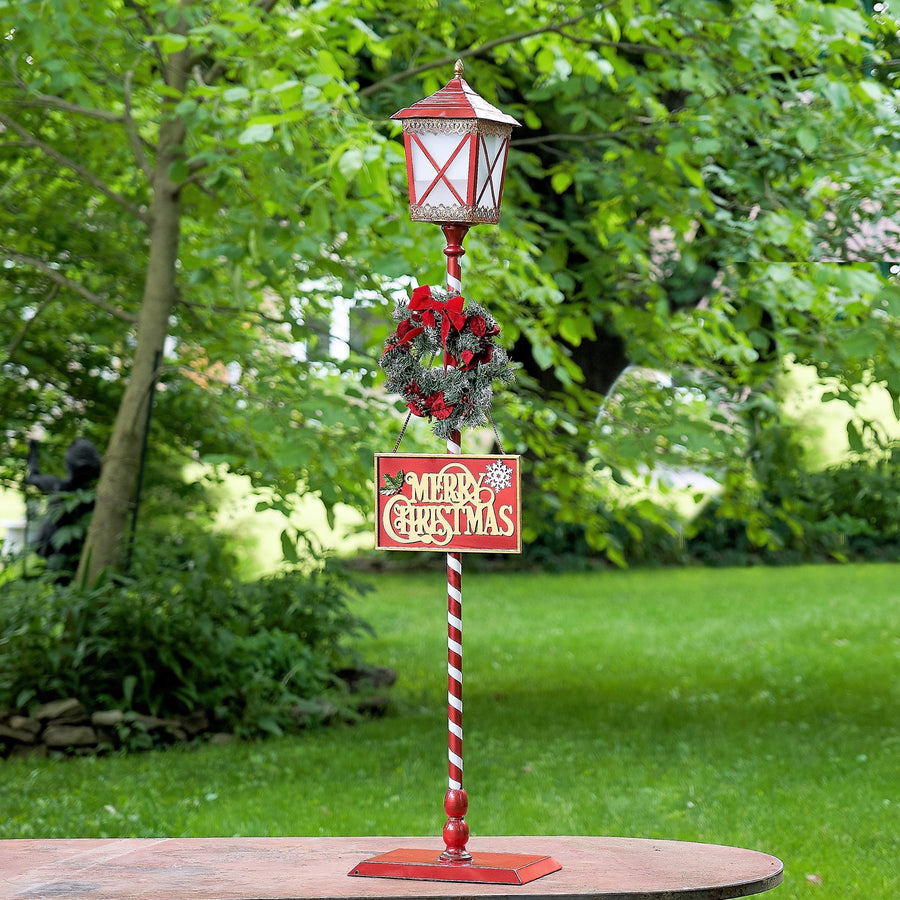 59" Tall Standing Iron Lantern with LED Lights and Wreath glossy red and white iron Christmas lantern with lit wreath