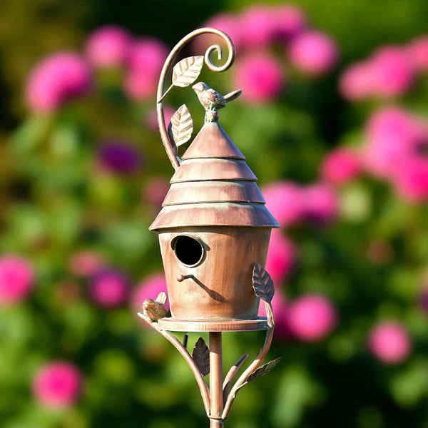 Antique copper Saran "Mary" birdhouse stake with tiered cone roof on a three prong garden stake