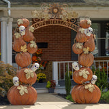 9.6 foot iron Happy Halloween walk through arch with stacked pumpkin and skull pillars, purple lights, and gold leaf accents