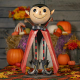 Big head iron vampire figurine with a lidded candy dish head on long skinny legs, hand painted