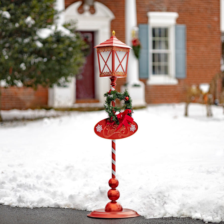 47.25 inch standing red and white iron solar Christmas lantern with lit wreath and round base