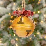 Set of nine hand painted galvanized metal Christmas bells in assorted colors with iron bows