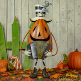 30.5 inch hand painted iron jack-o-lantern playing an accordion, orange, black, and white with glitter