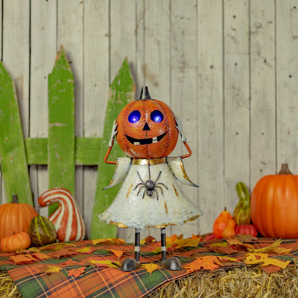 Iron jack-o-lantern ghost figurine in orange and white matte with purple LED lights