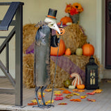 34 inch hand painted iron vulture in a top hat holding a pumpkin cane, black and white distressed finish