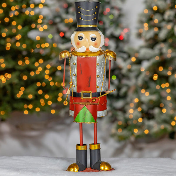23" Tall Metal Nutcracker Figurine with Drum "Hans" hand painted iron nutcracker with a drum, distressed antique finish