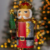 19.25" Tall Metal Nutcracker Figurine with Christmas Tree "Fritz" hand painted distressed iron holiday figure