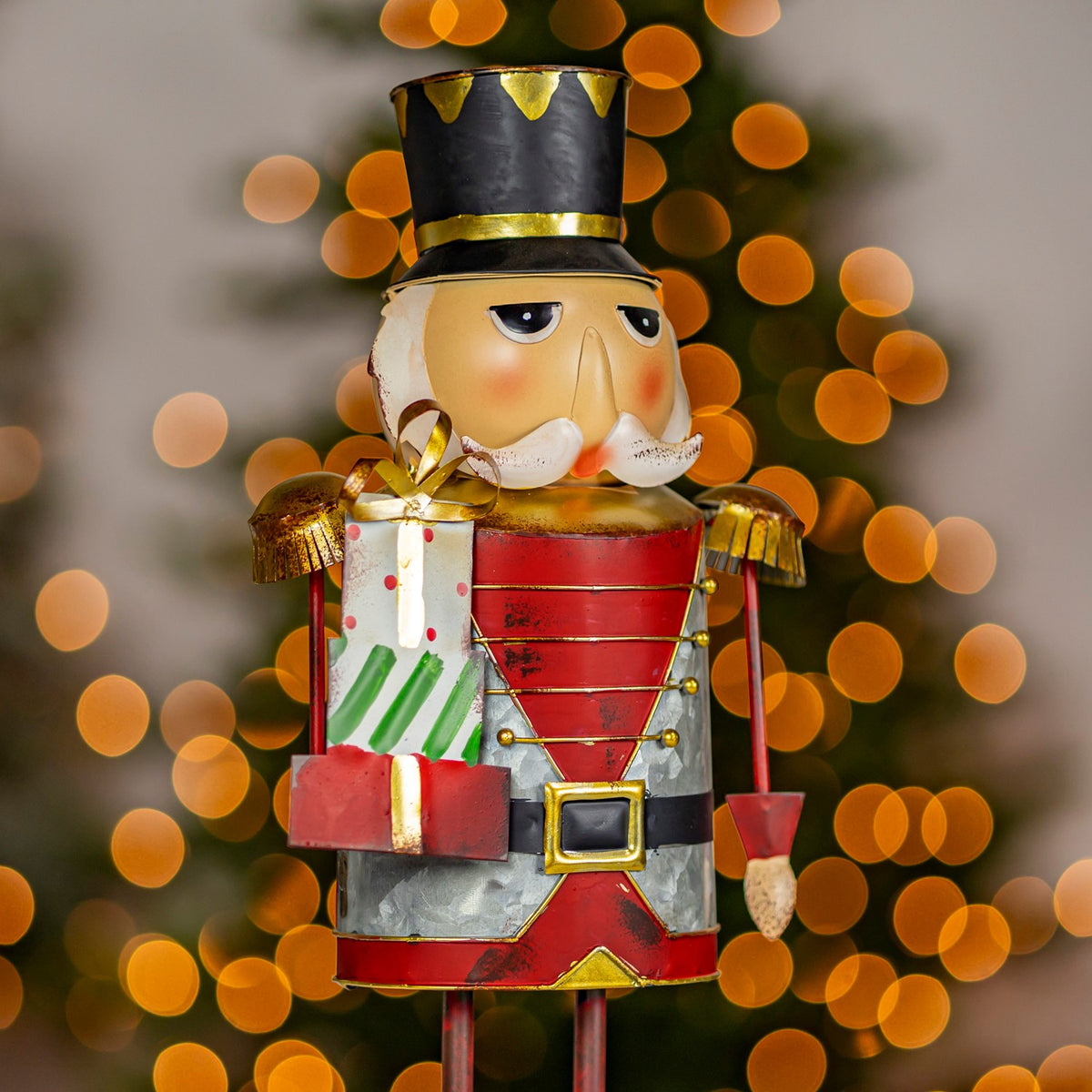 17.25" Tall Metal Nutcracker Figurine with Gifts Nikolai hand painted iron nutcracker figurine holding gifts