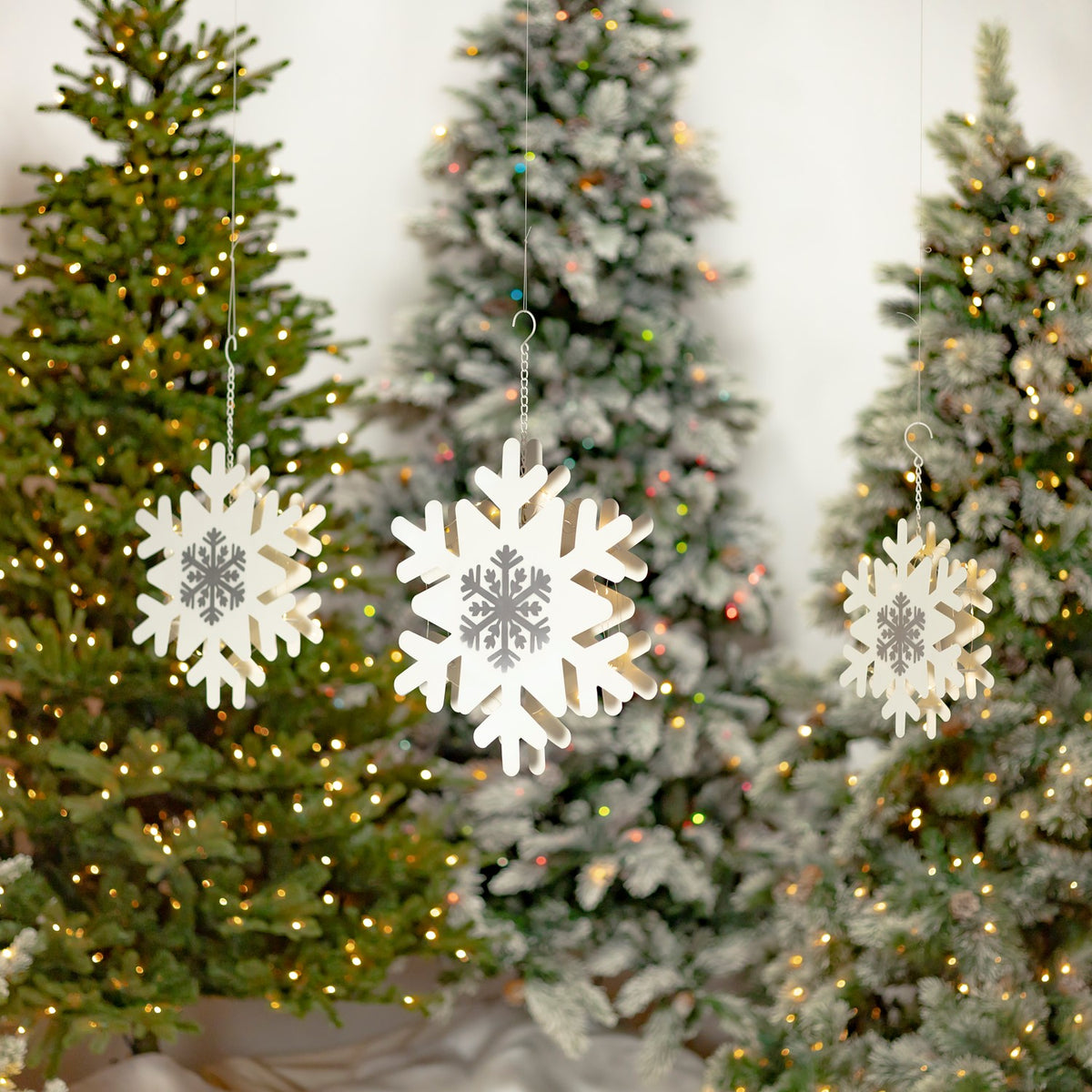 Set of 3 hanging white and silver iron snowflakes with silver glitter and LED backlights