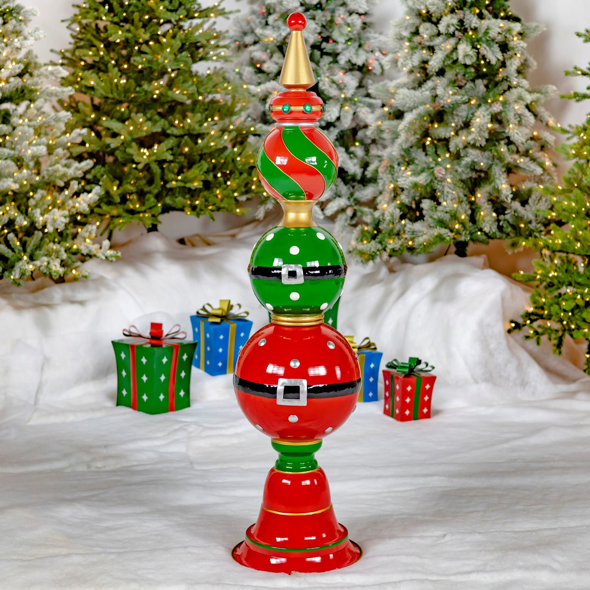 Tall Santa inspired iron Christmas ornament tower with belt buckle details and gold trim
