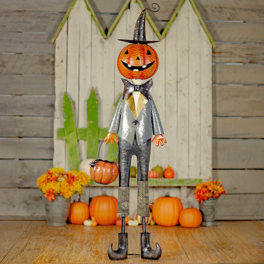 56.5 inch iron jack-o-lantern gentleman with top hat, bow tie, and basket of spiders, distressed black and orange