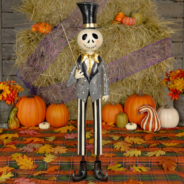 36 inch iron skeleton boy holding a spiderweb umbrella, distressed black and white hand painted finish