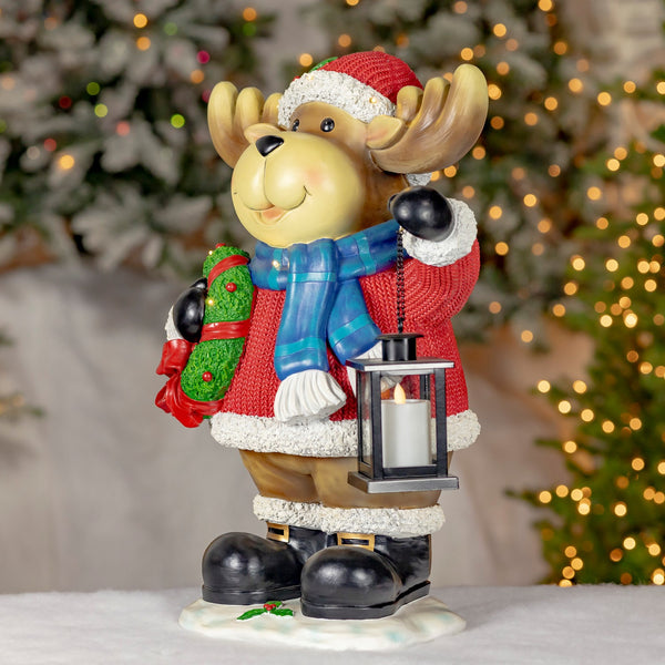 24.2 inch hand painted polyresin Christmas moose with wreath and lantern with faux electric candle